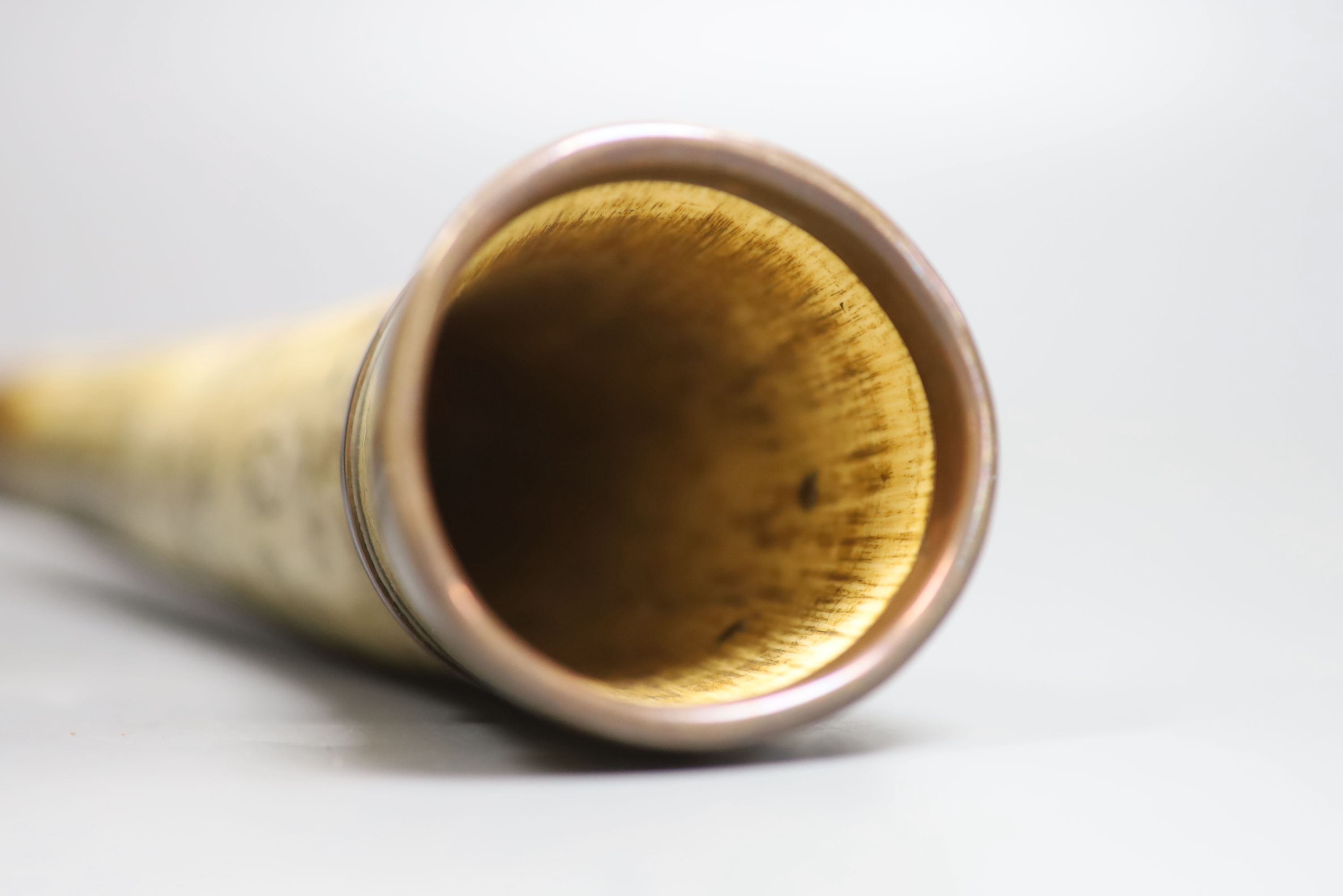 A scrimshaw horn beaker, bearing date 1837, 28cm